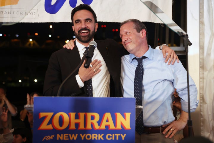 Democratic mayoral candidate Zohran Mamdani, left, speaks on stage with fellow candidate Comptroller Brad Lander at his primary election party, Wednesday, June 25, 2025, in New York. (AP Photo/Heather Khalifa)