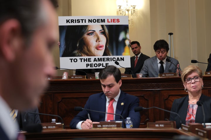 An image of U.S. Secretary of Homeland Security Kristi Noem is seen as Rep. Shri Thanedar (D-MI) questions Secretary Noem during a House Homeland Security Committee hearing in the Cannon House Office Building on December 11, 2025 in Washington, DC. (Photo by Anna Moneymaker/Getty Images)