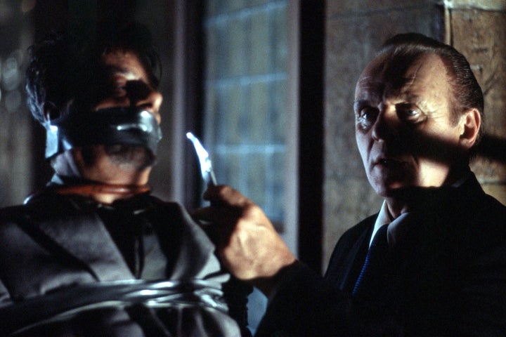Actors Anthony Hopkins (right) and Giancarlo Giannini perform in a scene from the 2001 film. 