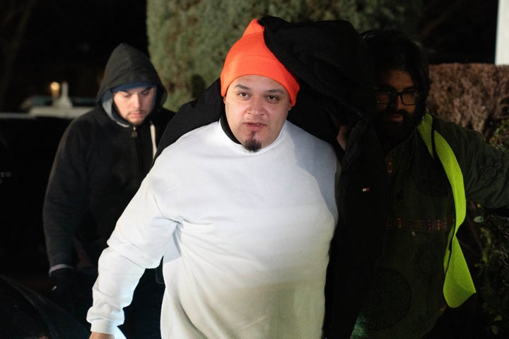 Kilmar Abrego GarcÃa arrives to his home in Beltsville, Md., Thursday, Dec. 11, 2025, after being released from ICE custody. (AP Photo/Jose Luis Magana)