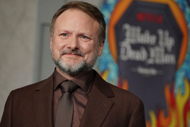 Rian Johnson arrives at the premiere of 