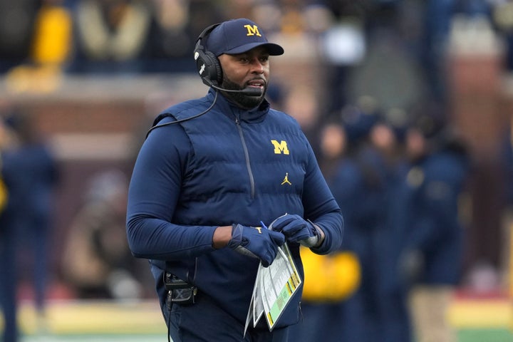 Moore, 39, was fired on Wednesday for what the school called an inappropriate relationship with a staff member. Hours later, he was in police custody.