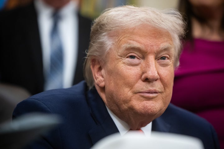 President Donald Trump during a bill signing ceremony in the Oval Office of the White House in Washington, DC, US, on Friday, Dec. 12, 2025. (Francis Chung/Politico/Bloomberg via Getty Images)
