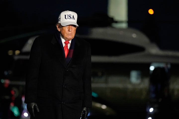 President Donald Trump talks to reporters as arrives on the South Lawn of the White House, Saturday, Dec. 13, 2025, after attending the Army-Navy game. (AP Photo/Jose Luis Magana)