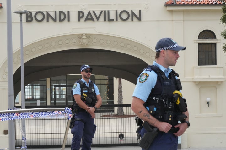 Police patrol in the early morning following a shooting Sunday at Sydney's Bondi Beach, on Dec. 15, 2025.