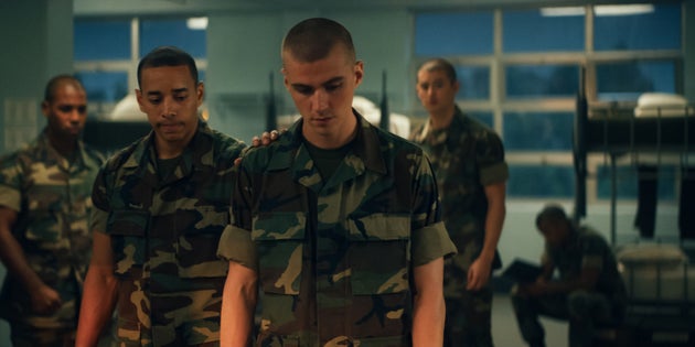 Dominic Goodman as Nash and Miles Heizer as Cameron Cope in Netflix's Boots