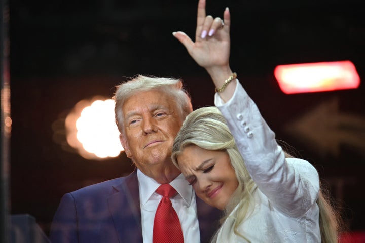 Erika Kirk and President Donald Trump embrace at Charlie Kirk's memorial service.