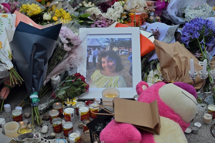 A photo of shooting victim Matilda, a 10-year-old whose last name has been withheld at the request of her family, is placed amongst flowers at a memorial made at the Bondi Pavilion in Sydney, Dec. 17, 2025, following Sunday's shooting. (Mick Tsikas/AAP Image via AP)