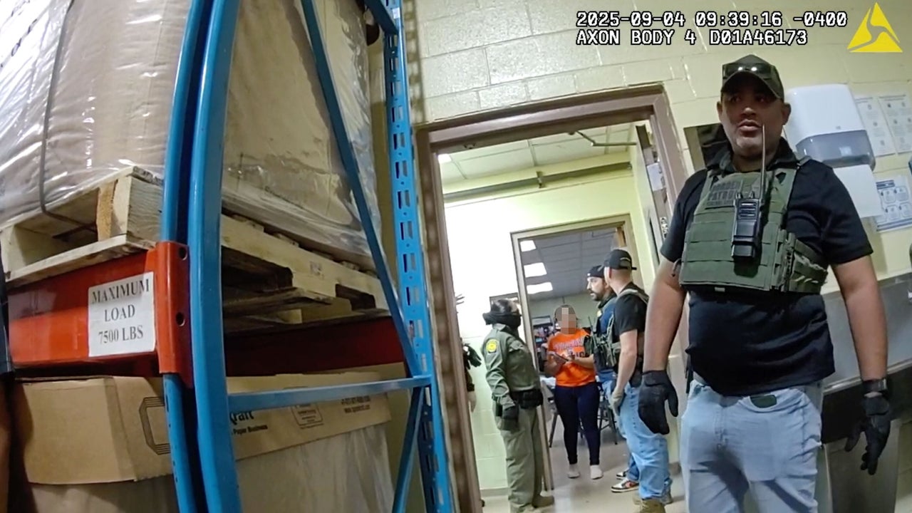 Federal agents at Nutrition Bar Confectioners in Cato, New York, on Sept. 4, 2025.