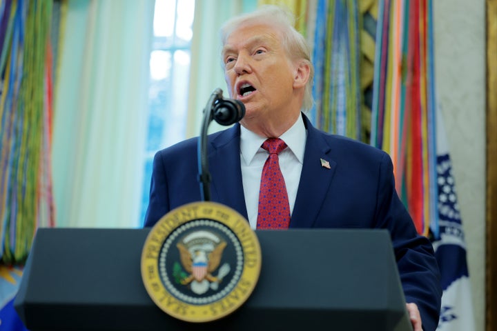 President Donald Trump speaking to reporter in the Oval Office of the White House on Dec. 15 in Washington, D.C.