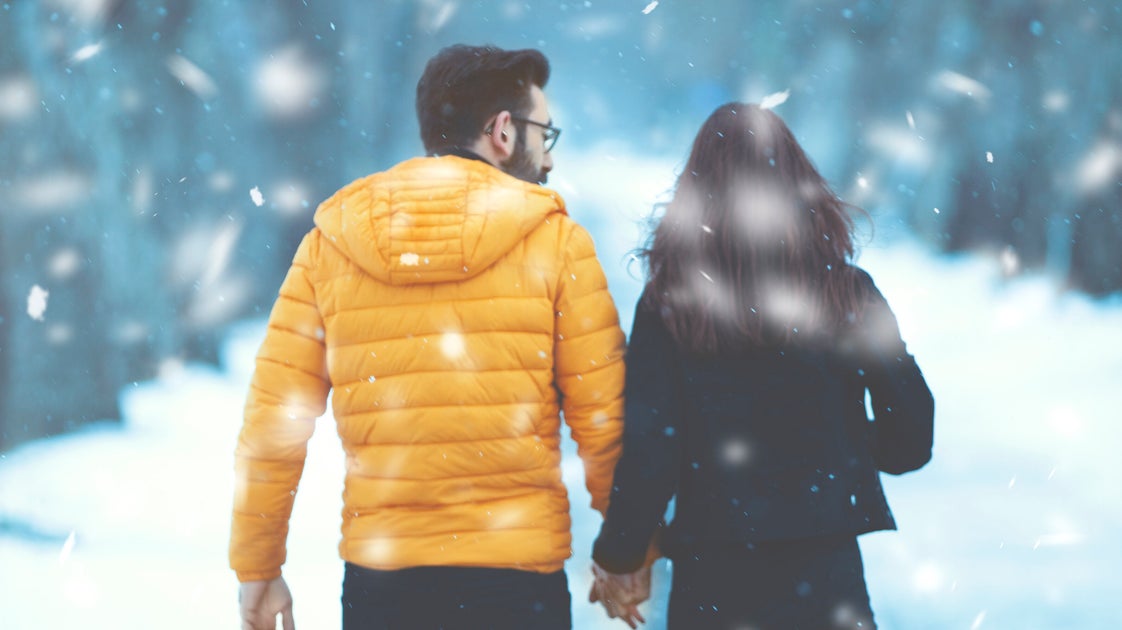 Couples Who Make This Controversial Choice Over The Holidays Are Actually Pretty 'Secure,' According To Experts