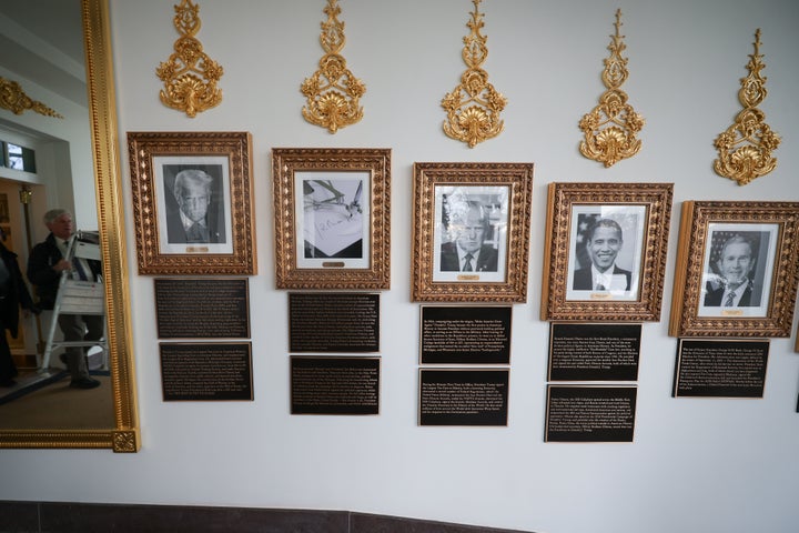 Newly installed plaques on the White House's "Presidential Walk of Fame" summarize the legacies of former presidents, as interpreted by President Donald Trump's administration. 