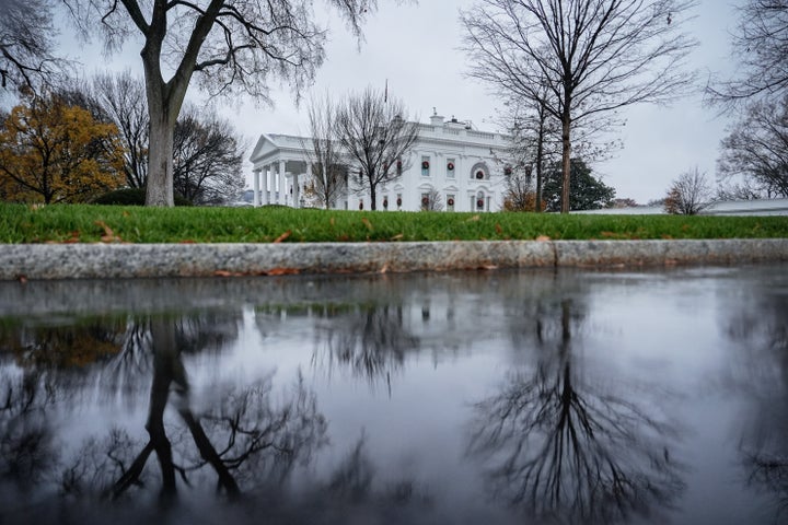 FILE - The White House is reflected in a puddle, Dec. 2, 2025, in Washington. (AP Photo/Julia Demaree Nikhinson, File)