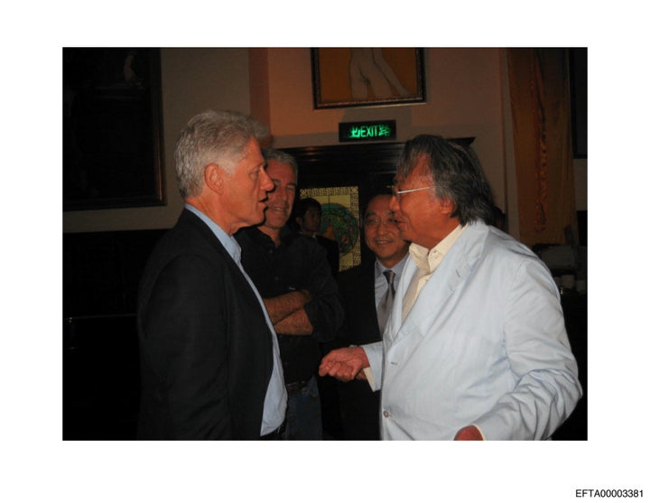 Bill Clinton and Jeffrey Epstein are seen in one of the images released by the US Department of State. (Photo by The US Justice Department / Handout /Anadolu via Getty Images)