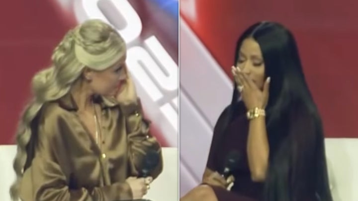 Erika Kirk onstage with Nicki Minaj at Turning Point USA's AmericaFest on Dec. 21, 2025.