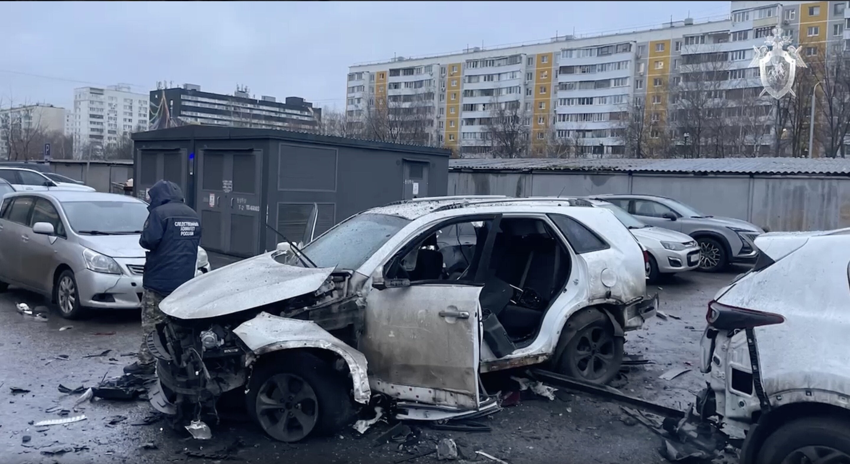 A screen grab from a video shows investigators and forensic experts from the Moscow Investigative Committee work at the scene of a car explosion in southern Moscow, Russia, on Dec. 22, 2025. Lieutenant General Fanil Sarvarov, Head of the Operational Training Directorate of the General Staff of the Armed Forces of the Russian Federation, lost his life in the explosion.