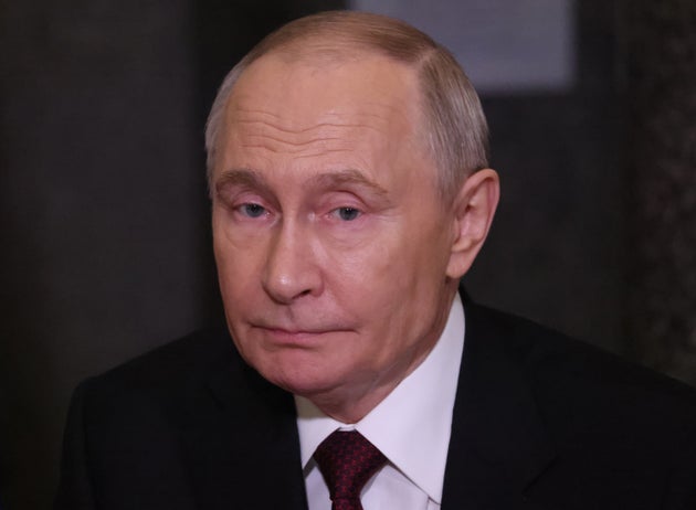 Russian President Vladimir Putin reacts during the Summit of Commonwealth States, on December 22, 2025 in Saint Petersburg, Russia. 