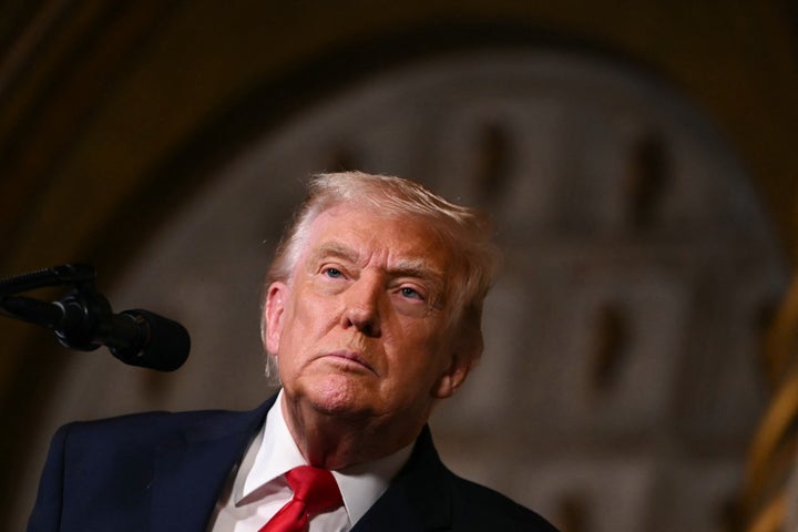 President Donald Trump takes questions from journalists after announcing the US Navy's new Golden Fleet initiative, unveiling a new class of warships, at Mar-a-Lago in Palm Beach, Florida, on December 22, 2025. (Photo by ANDREW CABALLERO-REYNOLDS / AFP via Getty Images)