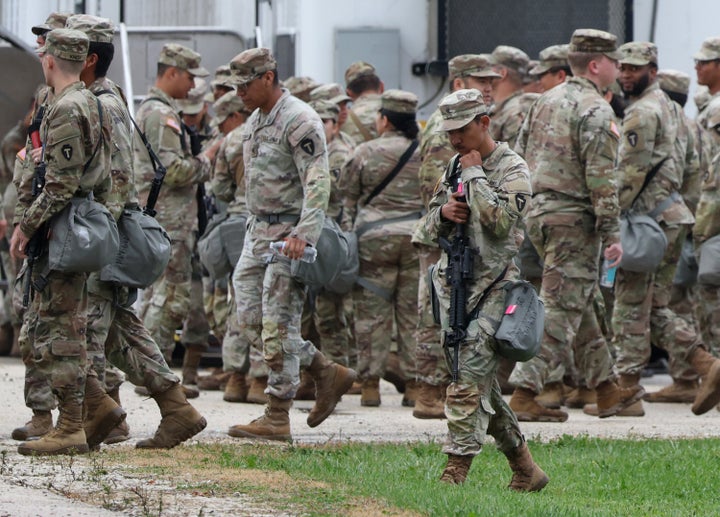 Members of the Texas National Guard assemble at the Army Reserve Training Center in Elwood, Illinois, a far southwest suburb on Oct. 7, 2025. (Brian Cassella/Chicago Tribune/Tribune News Service via Getty Images)