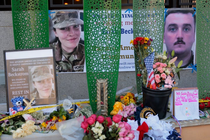 A makeshift memorial stands outside the Farragut West Metro station on December 01, 2025 in Washington, DC. Sarah Beckstrom, one of the two West Virginia National Guard troops who were shot blocks from the White House on November 26, died on Thursday, November 27, following what authorities called a targeted attack. (Photo by Heather Diehl/Getty Images)