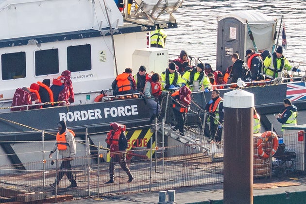 An Border Force vessel delivers migrants to Dover port after intercepting a small boat crossing on December 17, 2025 in Dover, England.