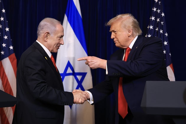 US President Donald Trump shakes hands with Israeli Prime Minister Benjamin Netanyahu during a press conference at his Mar-a-Lago club on December 29, 2025 in Palm Beach, Florida.