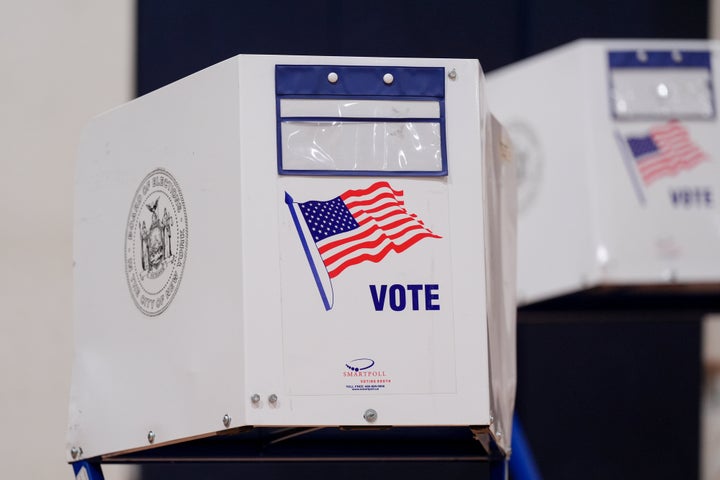 Voting booths at a polling station inside Frank Sinatra School of the Arts High School in the Queens borough of New York, US, on Tuesday, Nov. 4, 2025. New Yorkers heading to the ballot box to select a new mayor face stark choices: a youthful socialist, a seasoned ex-governor or a red-beret-wearing radio host. Photographer: Adam Gray/Bloomberg via Getty Images