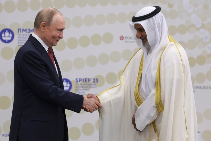 Russian President Vladimir Putin (left) and OPEC Secretary General Haitham al-Ghais in St. Petersburg, Russia, on June 20, 2025. Held at Constantine's palace outside St. Petersburg, St. They shake hands during their meeting on the sidelines of the St. Petersburg International Economic Forum.