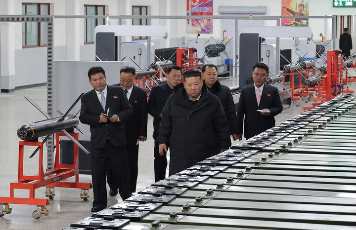 In this photo provided by the North Korean government, leader Kim Jong Un visits a major munitions factory at an undisclosed place in the country, on Jan. 3, 2026. Independent journalists were not given access to cover the event, and so cannot be independently verified.