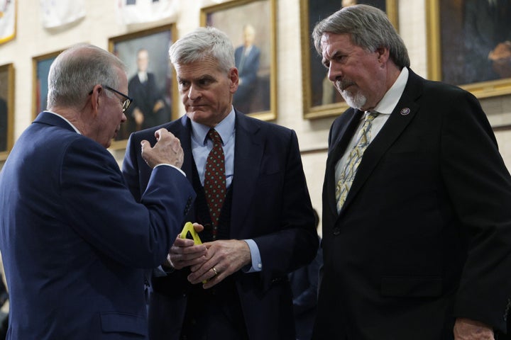 U.S. Sen. Bill Cassidy (R-LA) (2nd L) and Rep. Doug LaMalfa (R-CA) (R) listen to Rep. Tim Walberg (R-MI) (L) during an announcement at the Department of Health and Human Services on December 18, 2025 in Washington, DC. (Photo by Alex Wong/Getty Images)