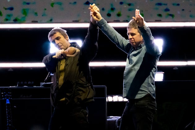 Liam and Noel Gallagher on stage in Toronto last year