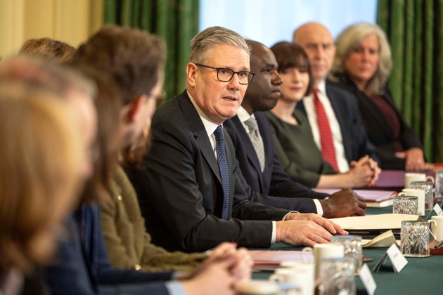 Keir Starmer, center, makes a statement to the political Cabinet at the start of the first cabinet meeting of the new year, at Downing Street, in London, Tuesday, Jan. 6, 2026. 