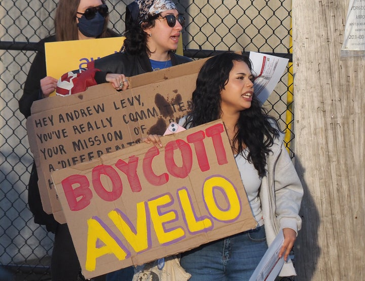 Camila Torres joins some 150 others in April to protest Avelo Airlines at Tweed New Haven Regional Airport in New Haven, Connecticut.