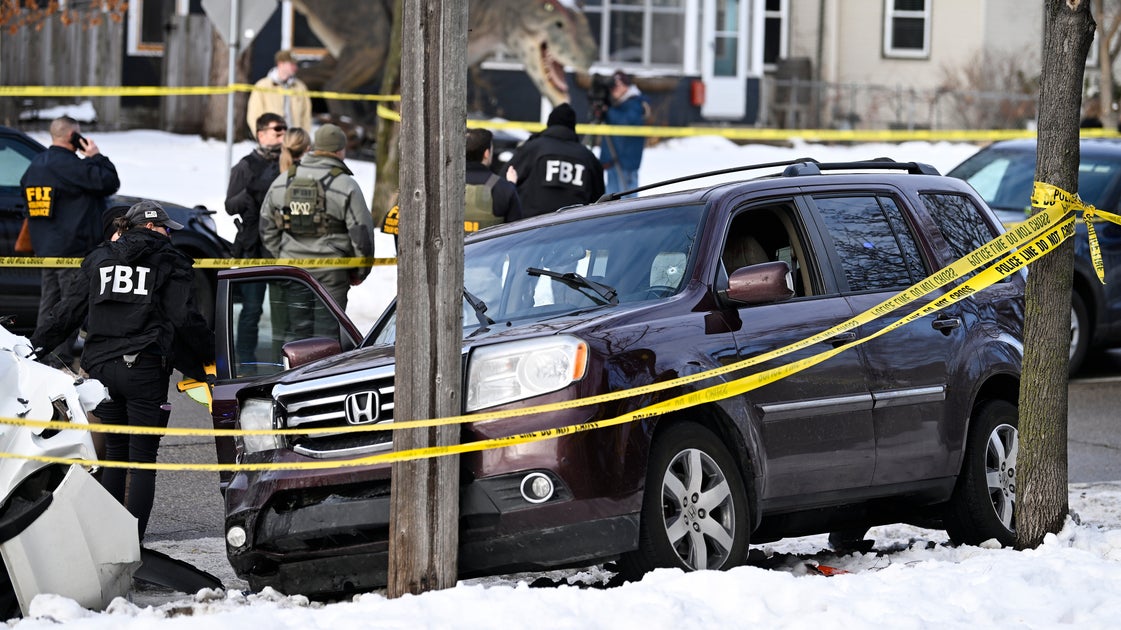 ICE Shooter's Unmasked Face Went Viral Almost Immediately. It Was AI.