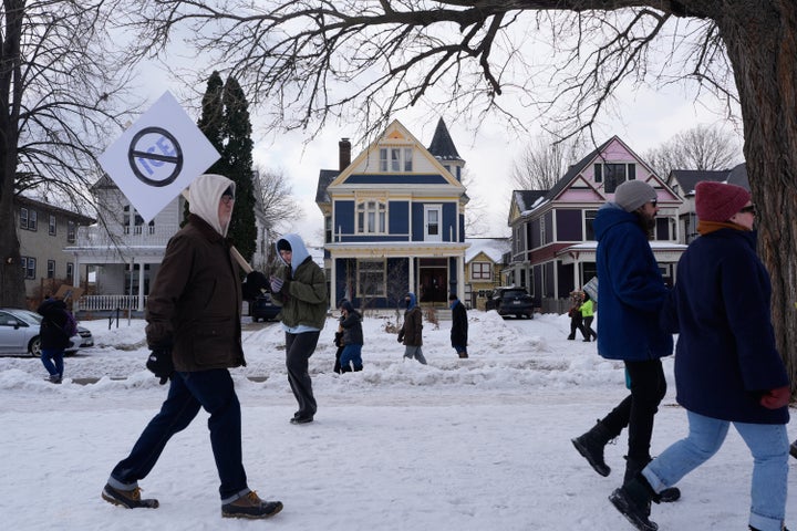 Protesters gather during a rally for Renee Good, who was fatally shot by an ICE officer earlier in the week, Friday, Jan. 10, 2026, in Minneapolis. (AP Photo/Jen Golbeck)