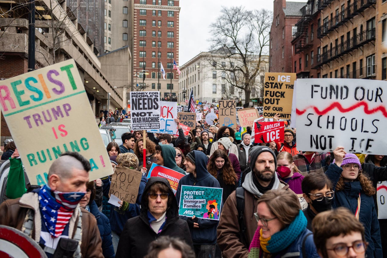 Demonstrators march through the streets during a demonstration over the fatal shooting of Renee Good by a US Immigration and Customs Enforcement (ICE) agent in Boston, Massachusetts, on January 10, 2026. (Photo by Joseph Prezioso / AFP via Getty Images)