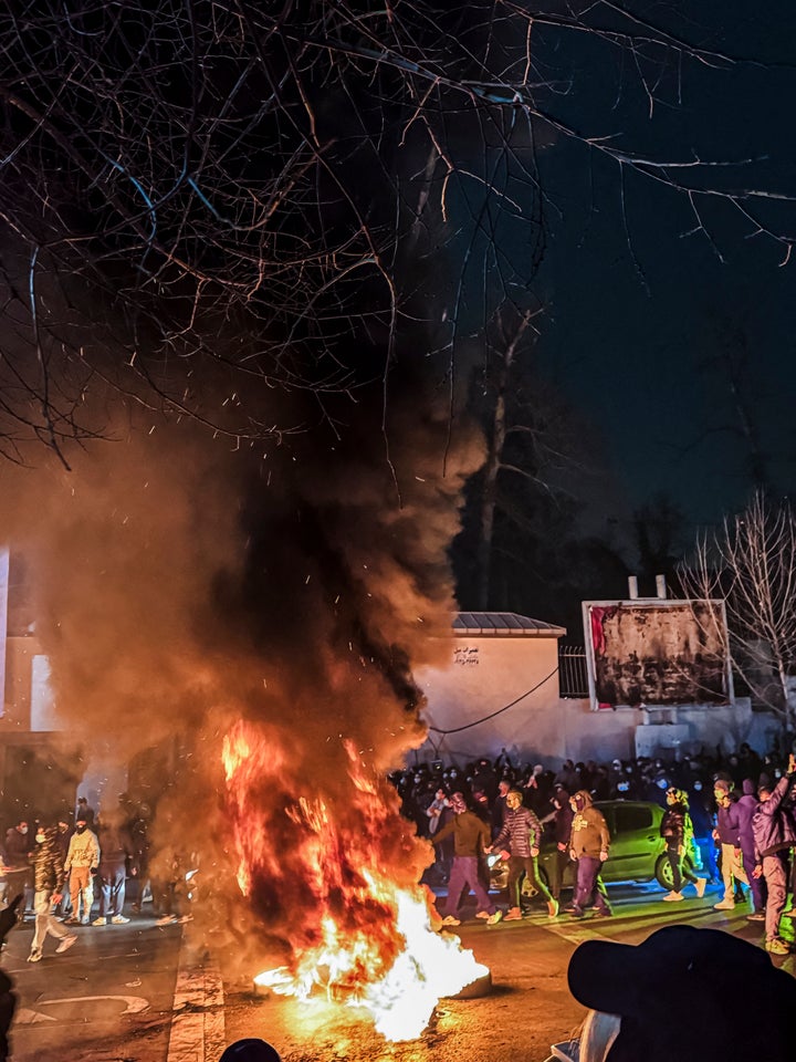 Iranians gather while blocking a street during a protest in Tehran, Iran on January 9, 2026. (Photo by MAHSA / Middle East Images / AFP via Getty Images)