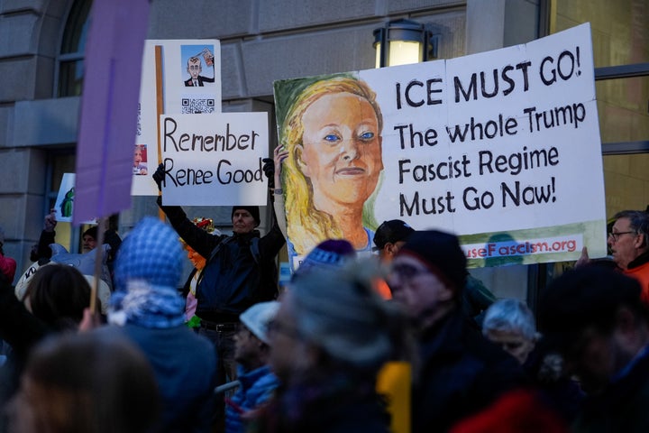 Demonstrators hold an image of Renee Good during a protest outside the U.S. Customs and Border Protection headquarters in Washington, D.C., on Tuesday.