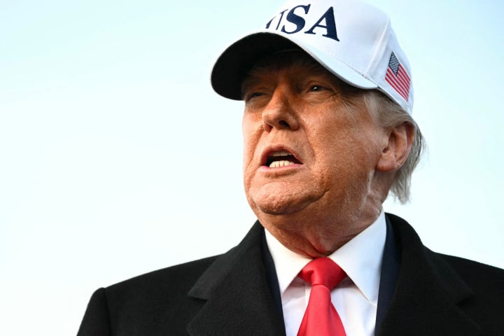 President Donald Trump speaks to the press upon returning to Joint Base Andrews in Maryland on Jan. 13, 2026. Trump is returning from speaking to The Detroit Economic Club in Detroit, Michigan, and a visit to a Ford production plant.