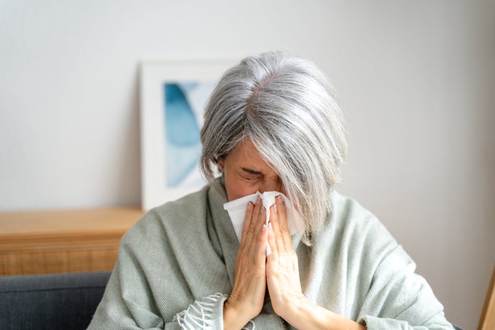 Flu symptoms this year might seem "worse" than previous flu seasons. Experts weighed in.