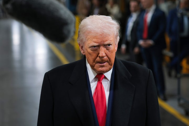 President Donald Trump walks the assembly line at the Ford River Rouge complex on Tuesday in Dearborn, Michigan.