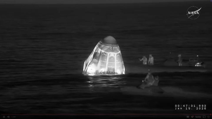 Recovery vessels approach the NASA's SpaceX Crew-11 capsule to evacuate one of the crew members after they re-entered the earth in a middle-of-the-night splashdown near San Diego.