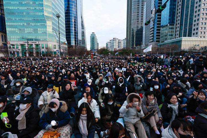 Tens of thousands of people gather to protest against then South Korean president Yoon Suk Yeol, as lawmakers vote on his impeachment outside the National Assembly Building, in Seoul, South Korea, on Dec. 7, 2024.