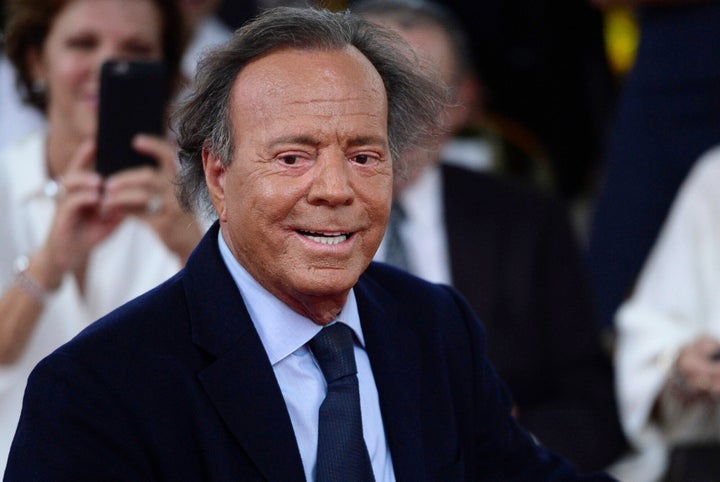 Grammy-winning singer Julio Iglesias on Friday denied allegations that he sexually assaulted two former workers, calling the accusations “absolutely untrue."