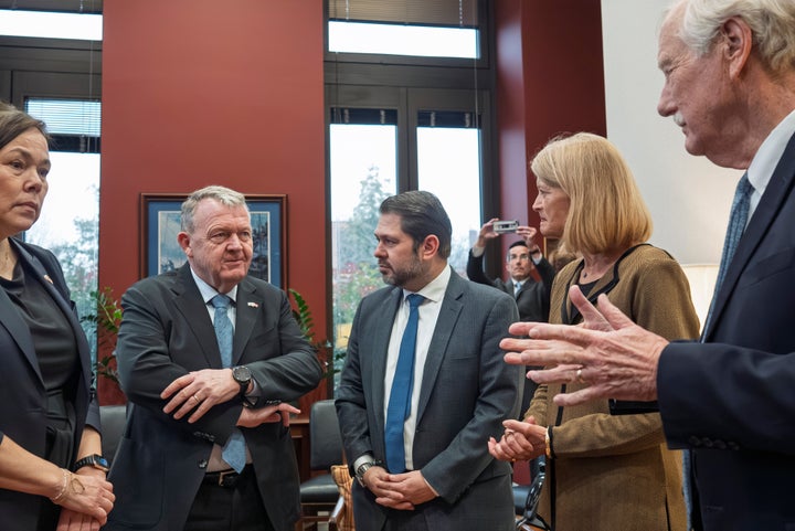 From left, Greenland Foreign Minister Vivian Motzfeldt, Danish Foreign Minister Lars Løkke Rasmussen, Sen. Ruben Gallego, D-Ariz., Sen. Lisa Murkowski, R-Alaska, and Sen. Angus King, I-Maine, talk during a meeting on Capitol Hill in Washington, Wednesday, Jan. 14, 2026. (AP Photo/J. Scott Applewhite)