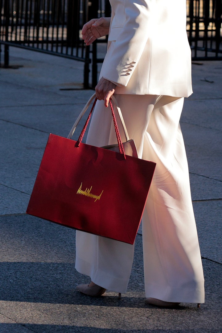 Venezuelan opposition leader and Nobel Peace Prize winner María Corina Machado carries a gift bag with President Donald Trump's signature on it outside the White House following a meeting with Trump on Jan. 15.