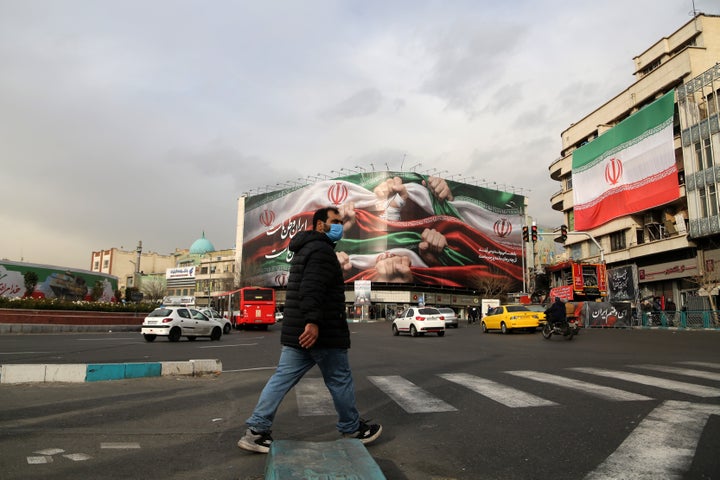 A pedestrian walks on the street at Enghelab Square in Tehran, Iran, Jan. 15, 2026. (Photo by Xinhua via Getty Images)