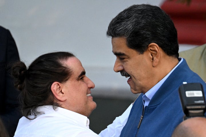Venezuela's President Nicolas Maduro welcomes Colombian businessman Alex Saab at the Miraflores Presidential Palace in Caracas on December 20, 2023.