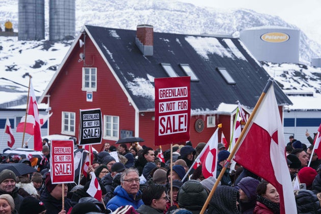 People protest against Trump's policy towards Greenland in front of US consulate in Nuuk, Greenland, Saturday, Jan. 17, 2026. (AP Photo/Evgeniy Maloletka)