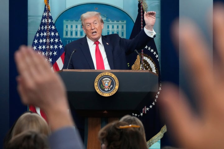 President Donald Trump speaks during a press briefing at the White House in Washington, Tuesday, Jan. 20, 2026. (AP Photo/Mark Schiefelbein)